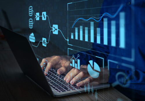 Analyst working with Business Analytics and Data Management System on computer to make report with KPI and metrics connected to database. Corporate strategy for finance, operations, sales, marketing